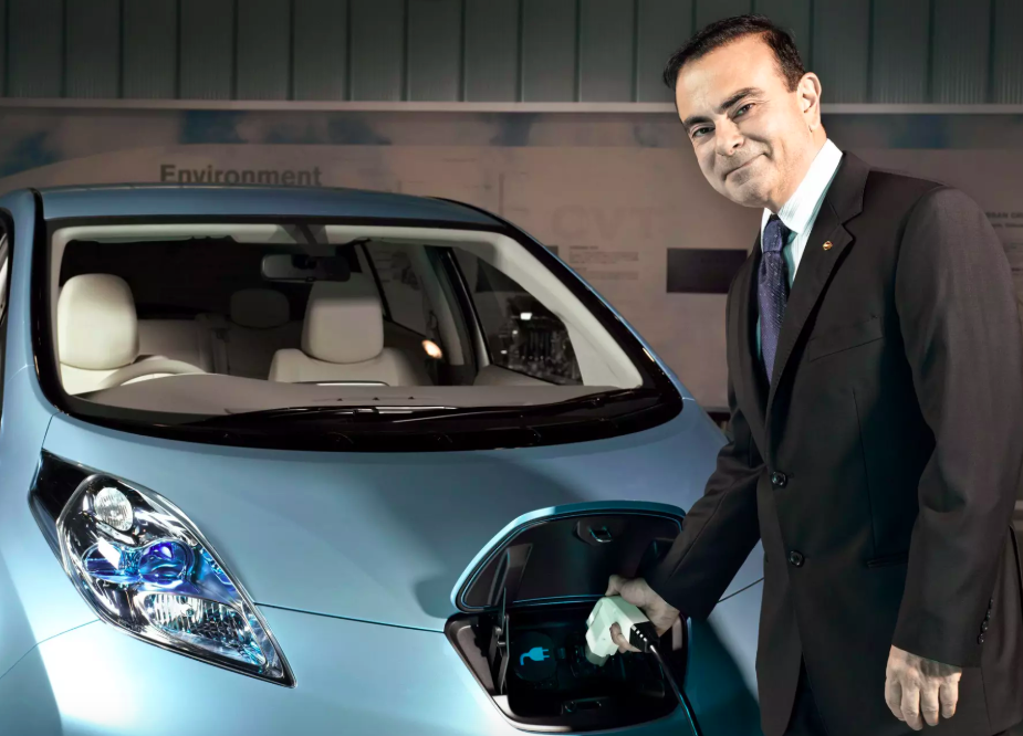 Carlos Ghosn with Nissan Leaf