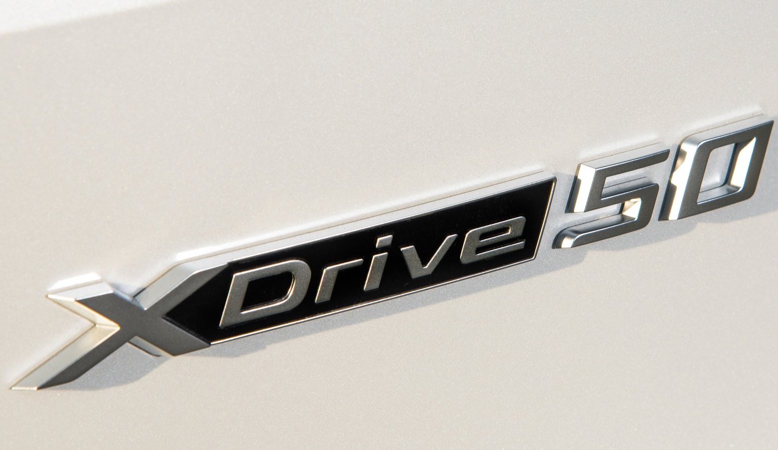 BMW iX xDrive50 Sport badge